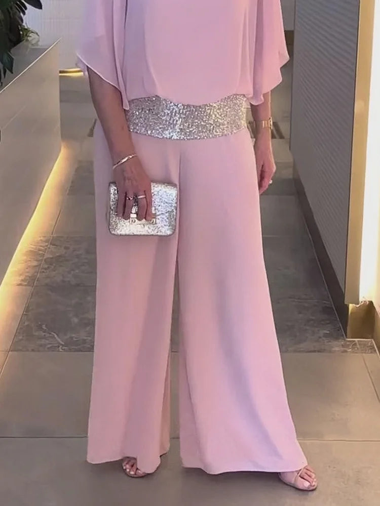 Marcelina | Elegante tweedelige set met pailletten en kleurrijk blokpatroon