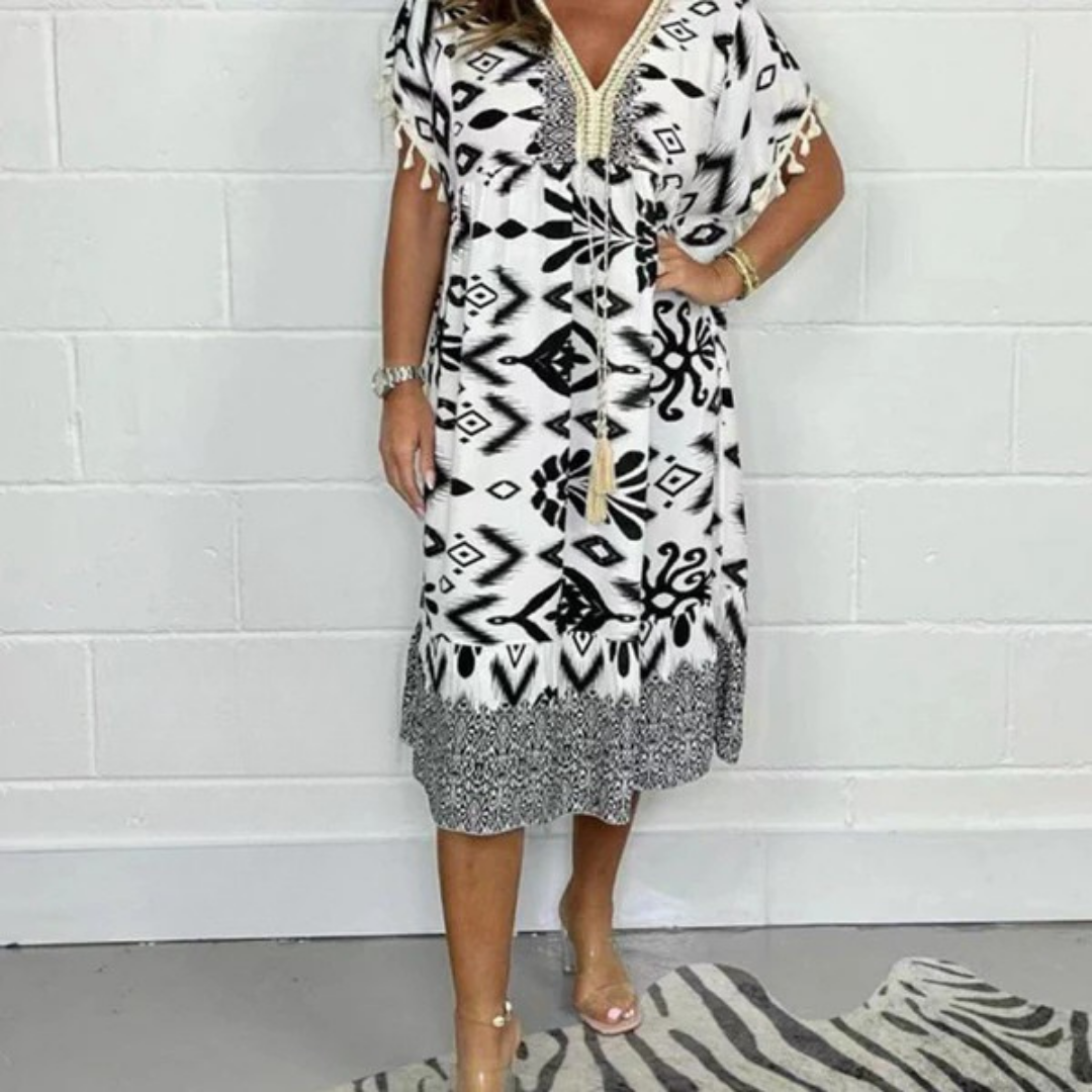 Nadia | Zomerjurk met V-hals en franjes op korte mouwen