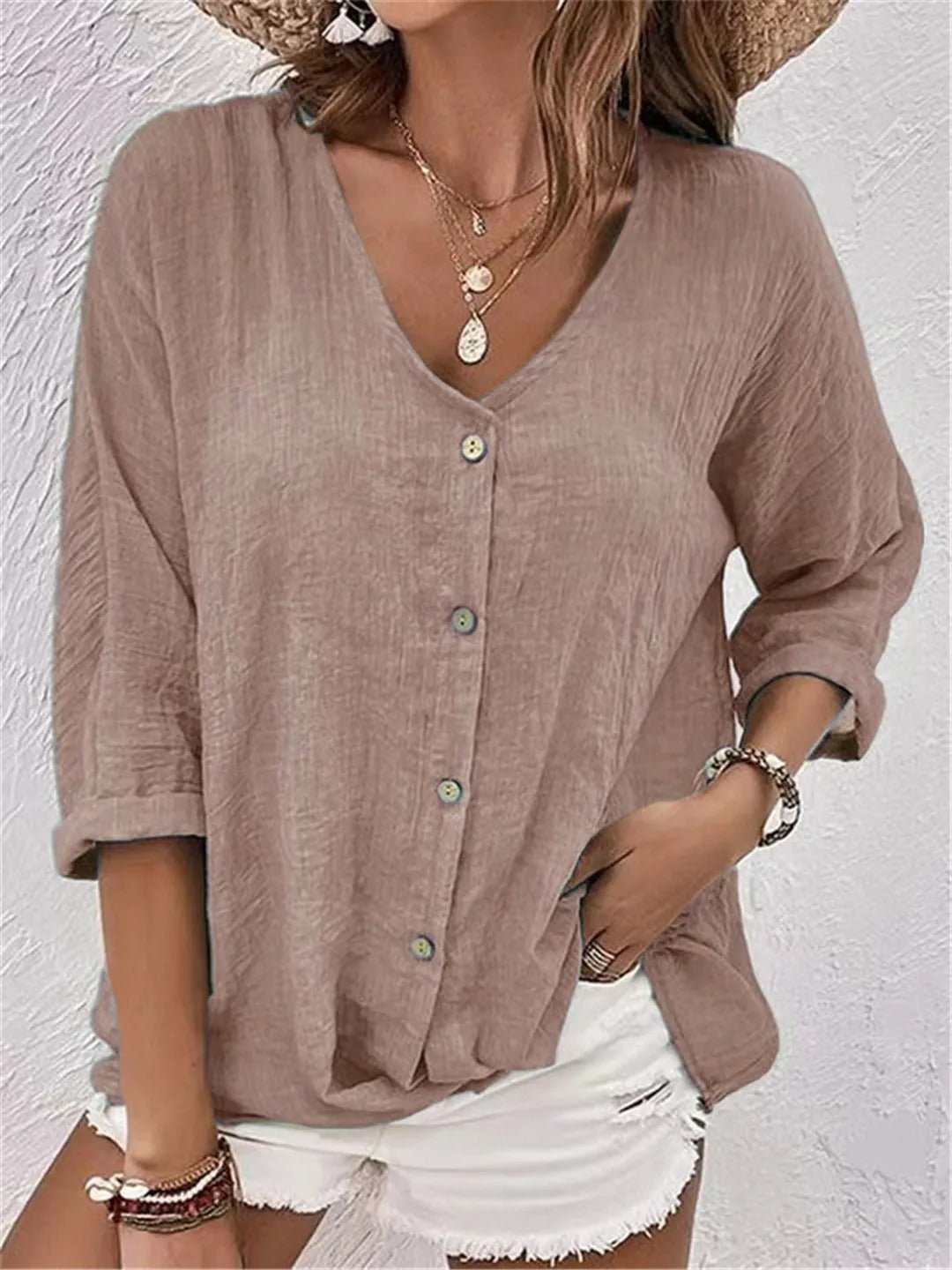 Stijlvolle blouse met V-hals en decoratieve knopen